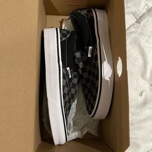 Black & grey checkered slip on vans